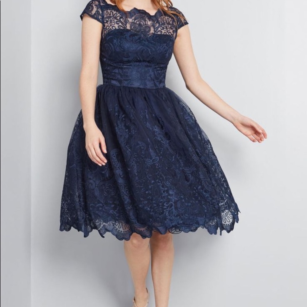 Chi Chi London premium lace navy blue cocktail dress sold by ModCloth